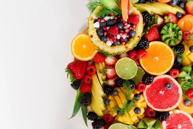 a plate of fruit and vegetables