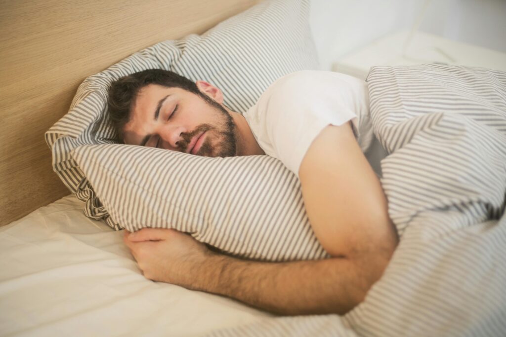 a man sleeping in bed